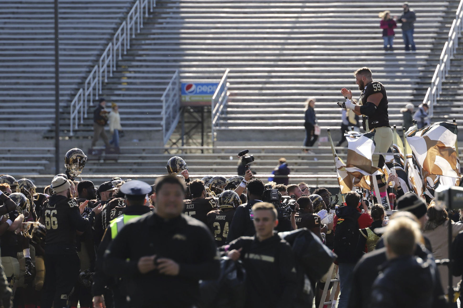The Western Michigan football team celebrates